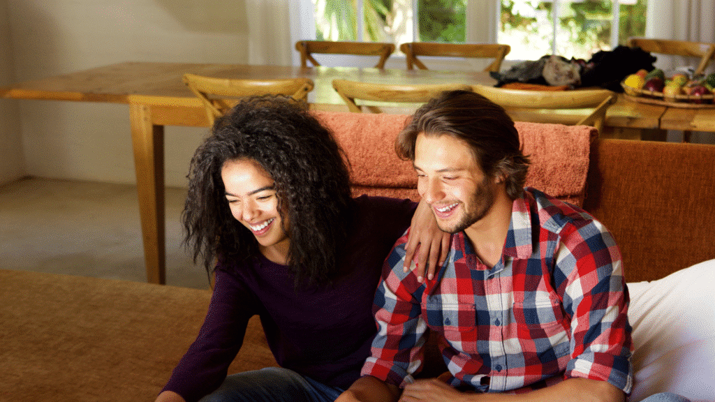 Young couple sitting in a modern living room