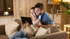 Young couple logging in to block and estate management customer portal