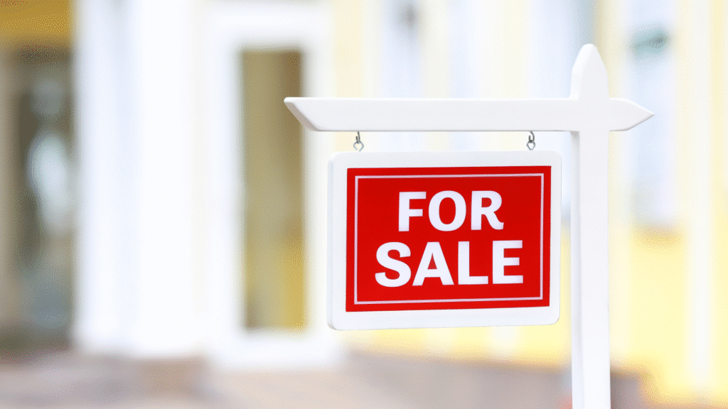 For Sale sign outside a modern property